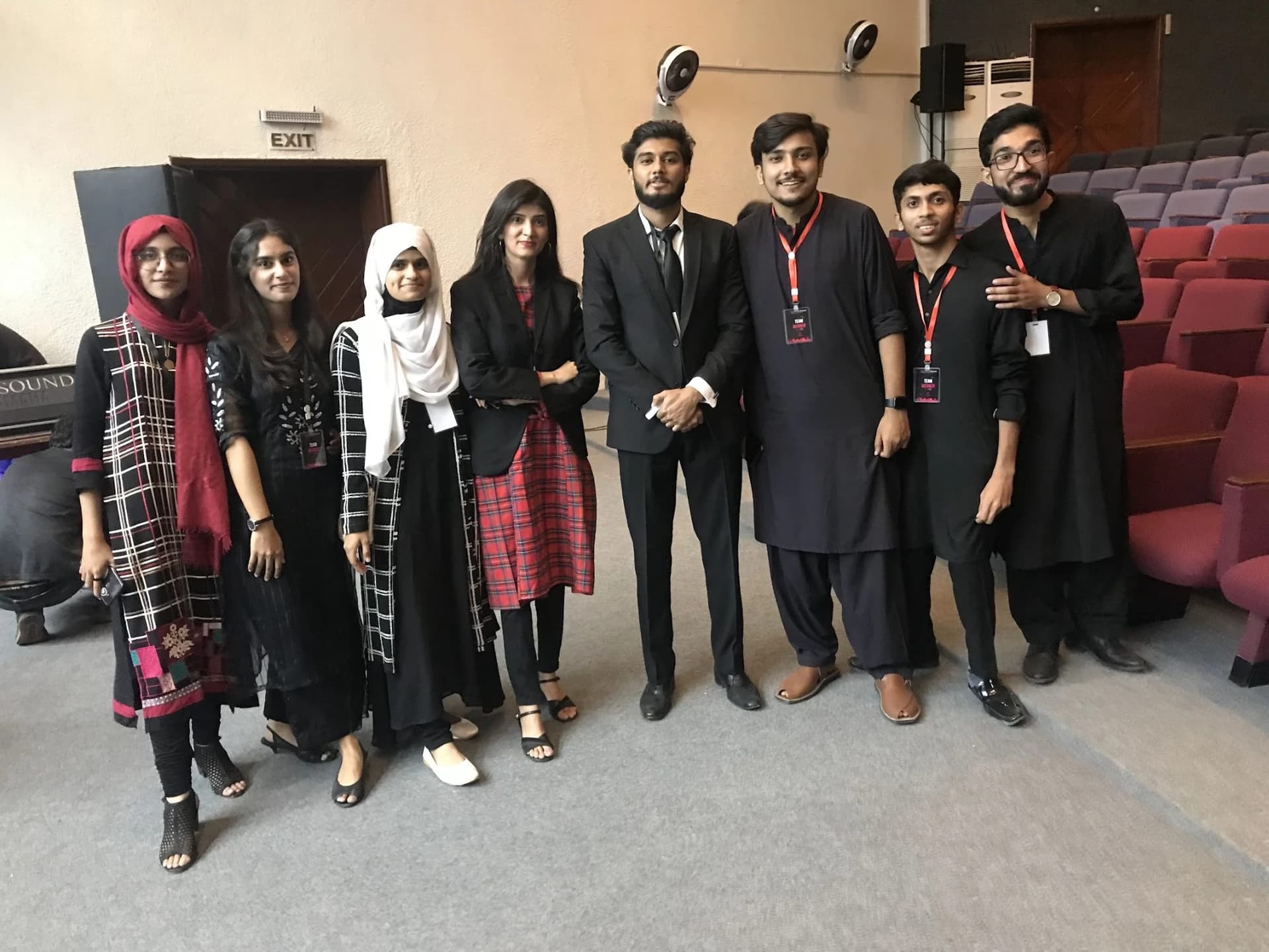 Lalain with the TEDxAzadi Street 2.0 team, wearing their team badges